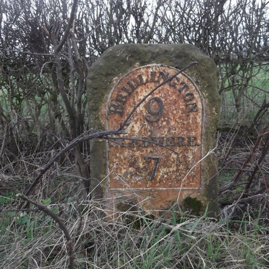 Milestone, ¼ mile W of jct. to Octon